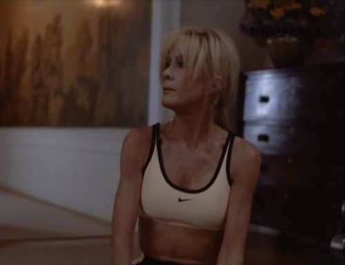 Joan Van Ark in sports bra