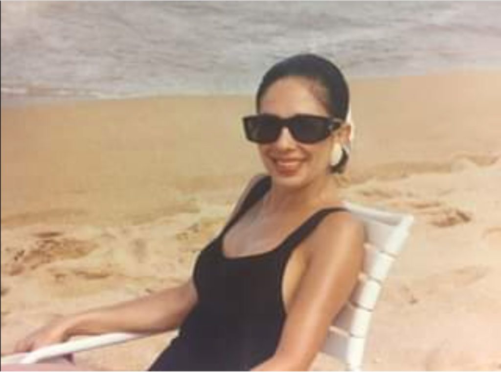 Jeanine Pirro in a black bathing suit