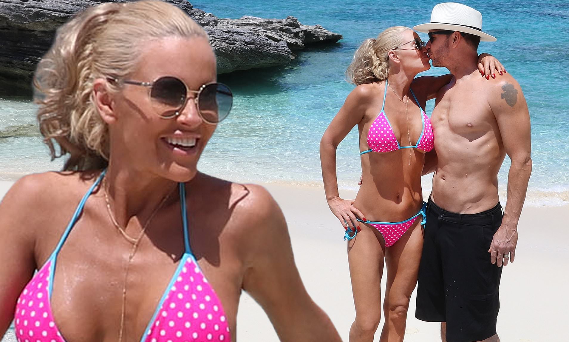 Jenny McCarthy in Pink Polka Dot Bikini on the Beach