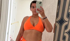 Nelly Furtado wearing a bikini with no makeup